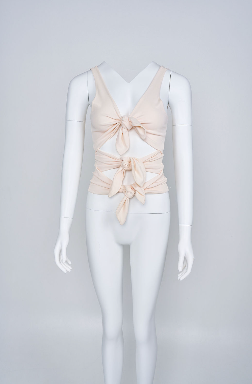 Preowned Valentino 2002 Ivory silk top with multiple tie details and deep V neckline